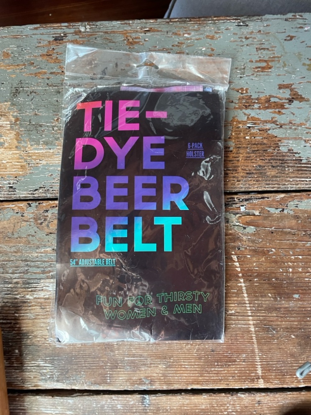 Urban Outfitters Tie-Dye Beer Belt Packaging - Black with Holographic Text